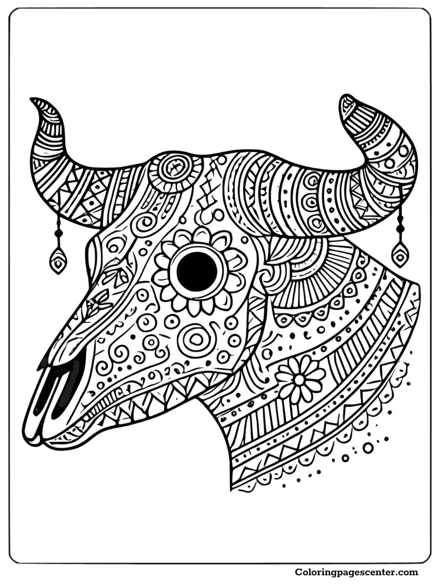 Detailed ornamental cow skull coloring page with tribal designs